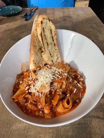Gather in Jackson Hole signature dishes Elk BologneseJackson Hole PinotPork Buns